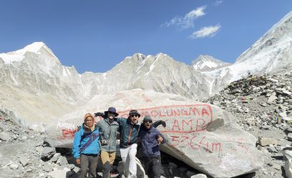 Lead guide Ajit with his guests at Everest Base Camp