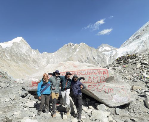 Lead guide Ajit with his guests at Everest Base Camp