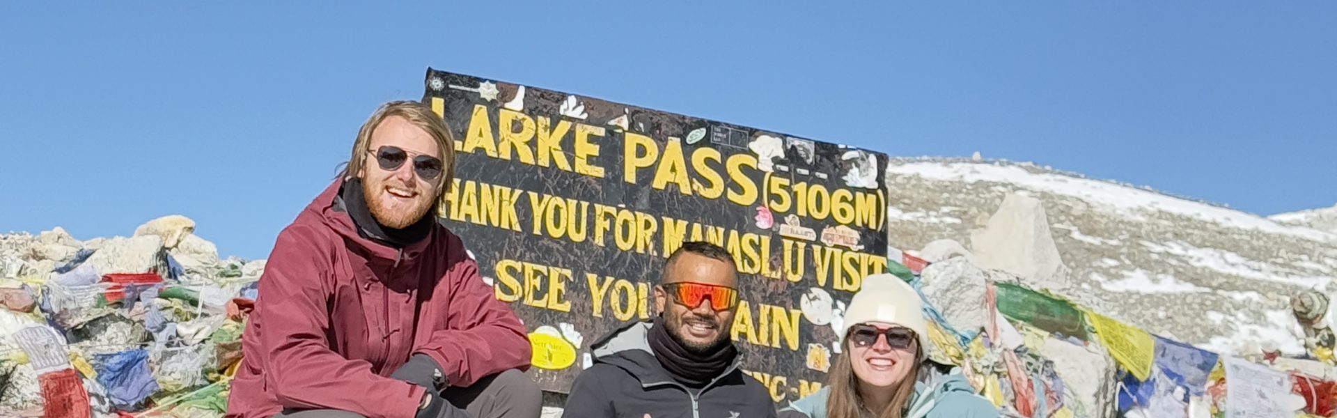 Lead guide Ajit with his guests at Larkya La Pass
