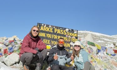 Lead guide Ajit with his guests at Larkya La Pass