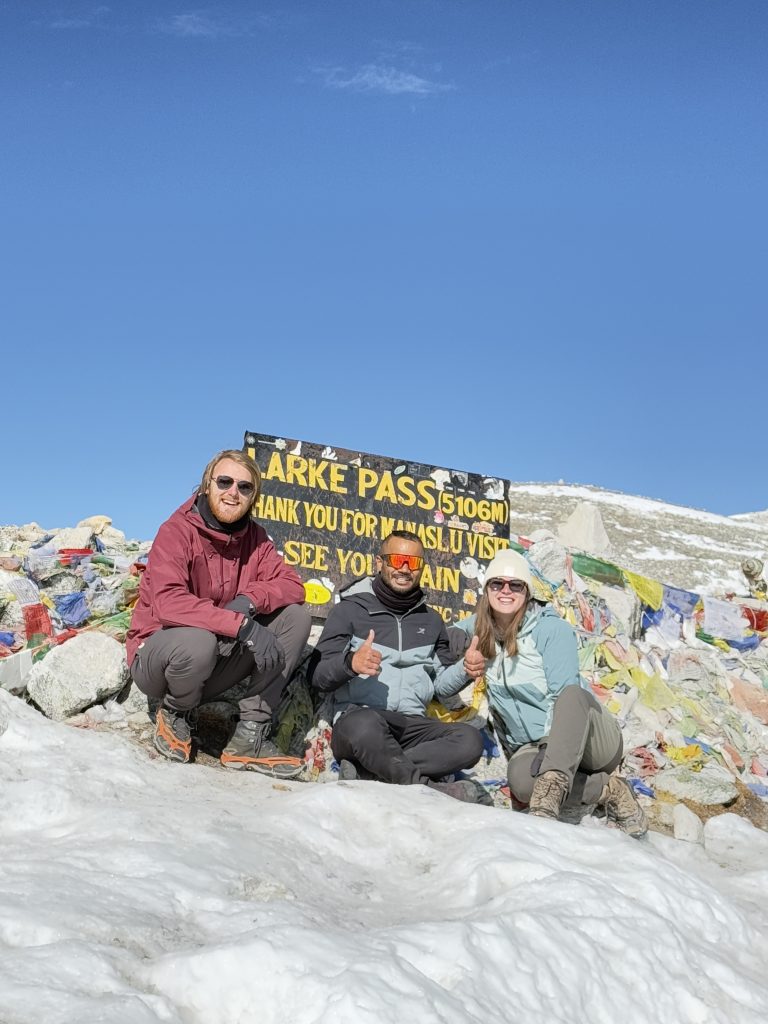 Lead guide Ajit with his guests at Larkya La Pass