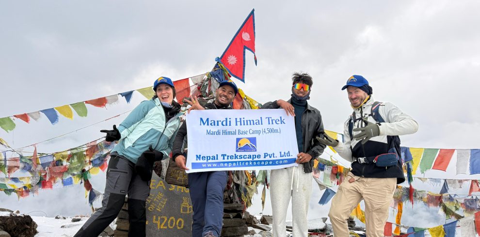 Lead Guide Ajit with his trekkers during Mardi Himal Trek